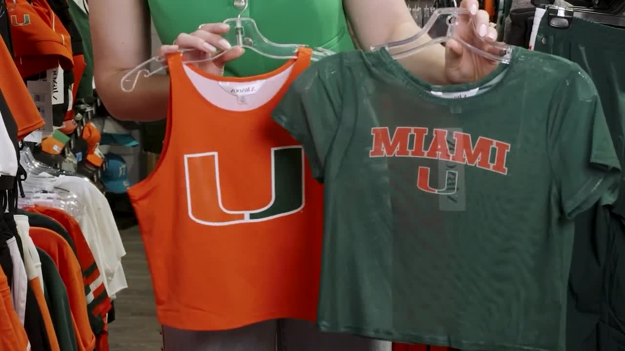 Elevate your game day look with Zoozatz tops, now available at Caneswear